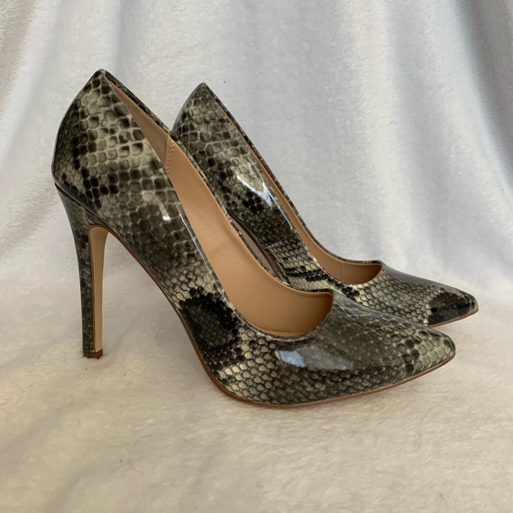 Snakeskin heels, never worn